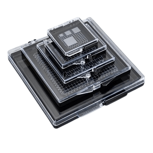 Stacked clear wafer cases for semiconductor chips, featuring grid patterns and secure closures.